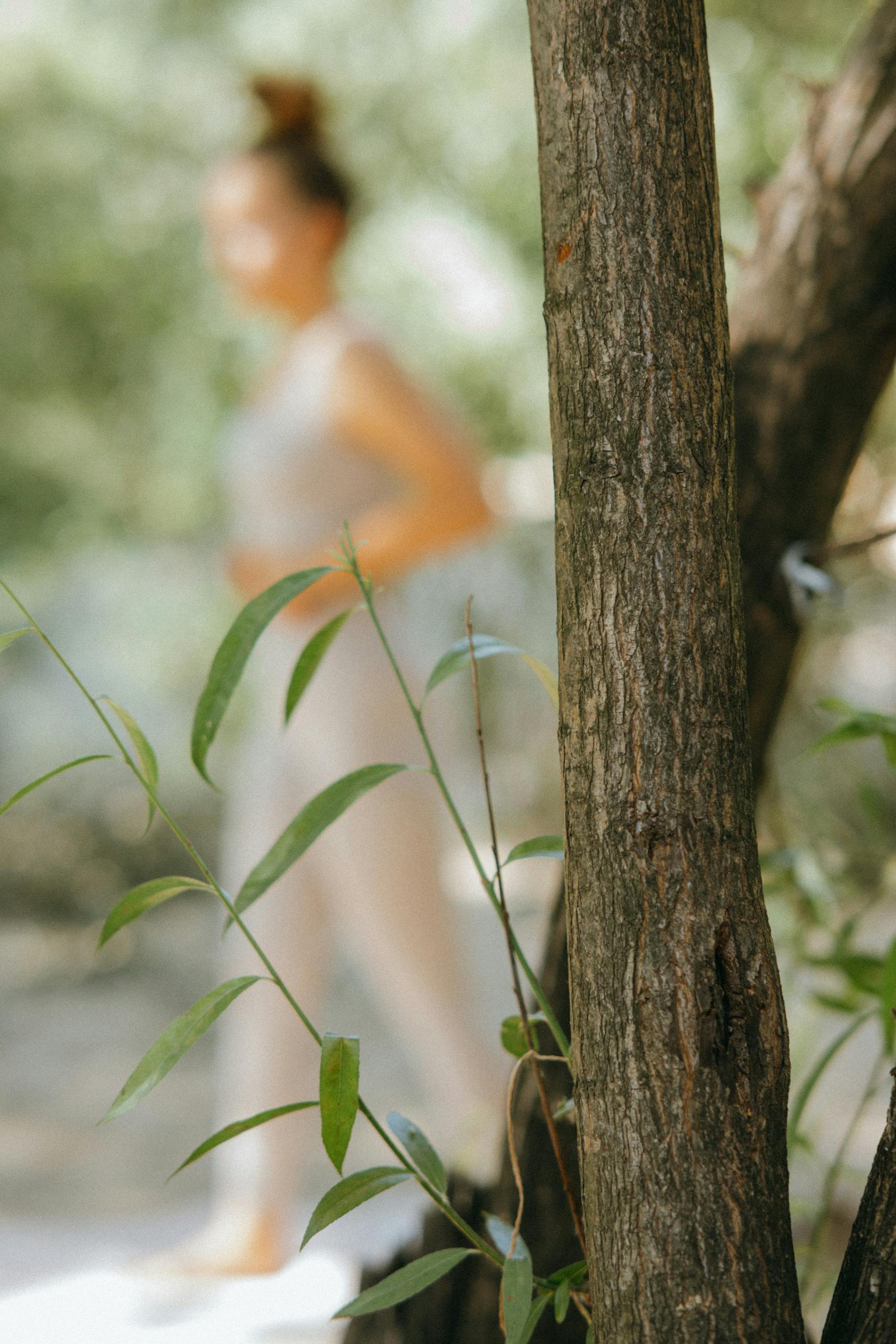 From Festive Feasts to Digestive Ease: 12 A woman practicing yoga outdoors, blending serenity and nature.
