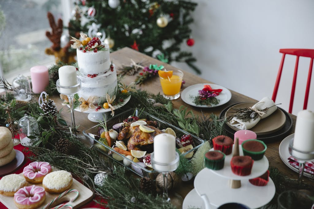 From Festive Feasts to Digestive Ease: 8 Holiday table setting with festive decorations, candles, and delicious food ready for a Christmas feast.